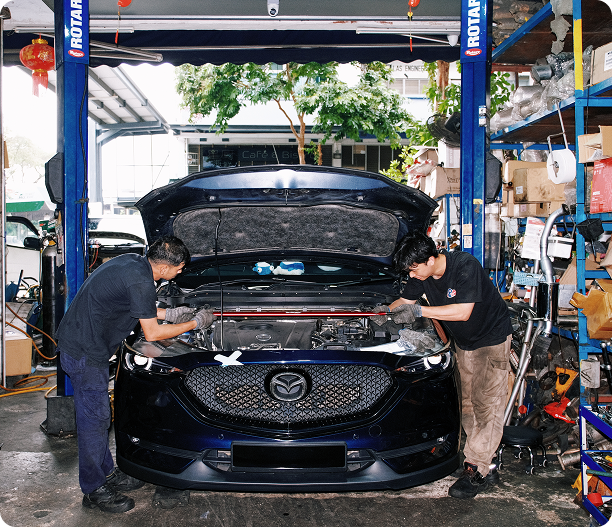A mazda being worked on