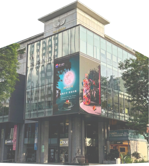 Corner LED screen advertising on a commercial building in Singapore