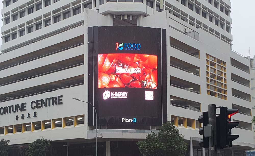 K-Food Korean strawberry ad on the façade LED screen at Fortune Centre, Singapore