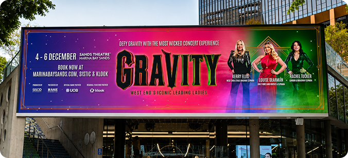 Premium billboard location at Design Orchard, Singapore, with a GRAVITY concert ad